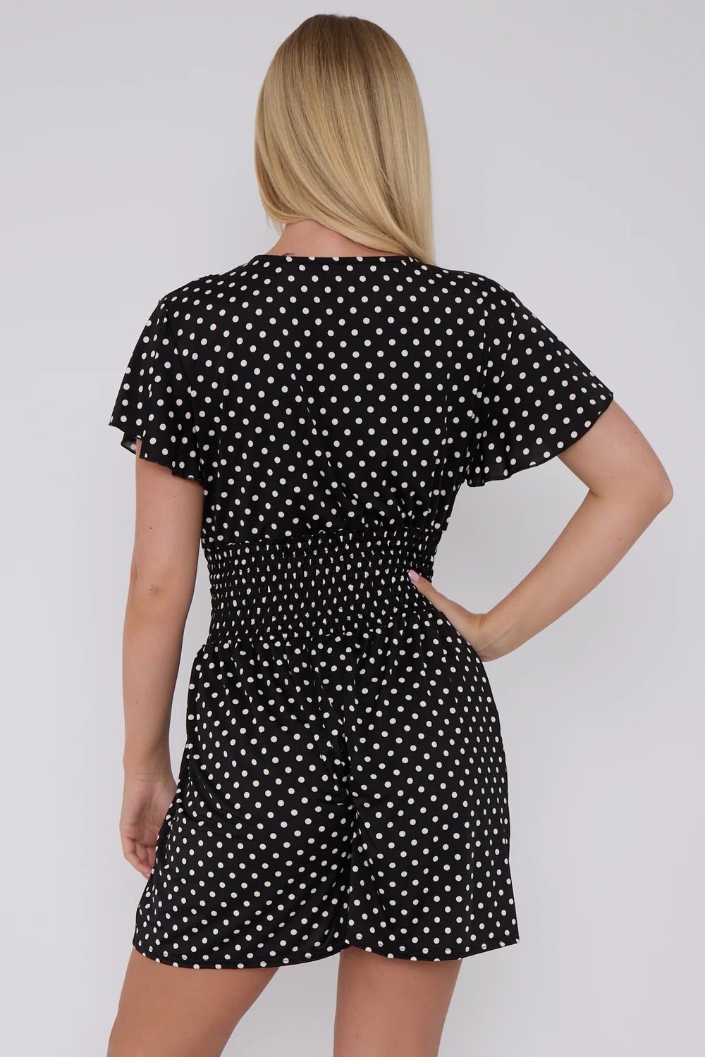 Claire™ | Polkadot V-hals Jumpsuit