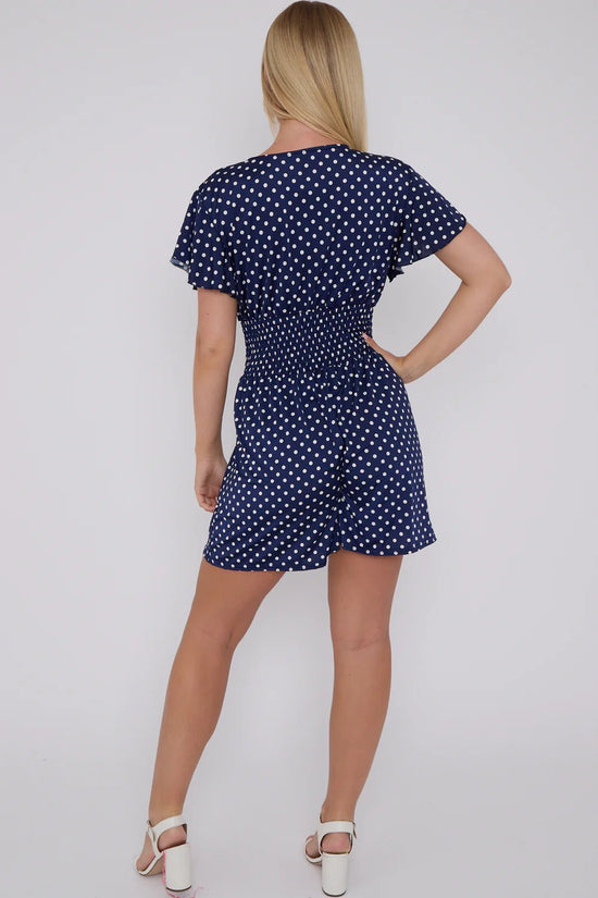 Claire™ | Polkadot V-hals Jumpsuit